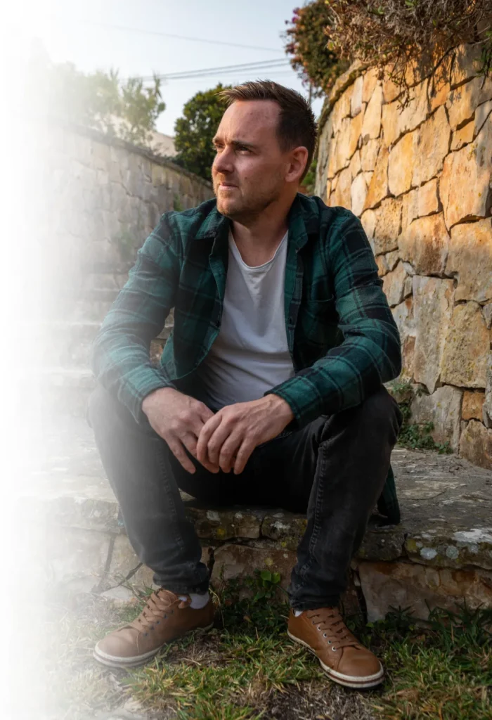 matt-eadie-sitting-outside-on-the-steps